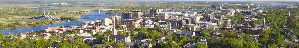 https://easyads.biz/wp-content/uploads/2022/02/Aerial-View-of-Downtown-Wilmington-North-Carolina.jpg