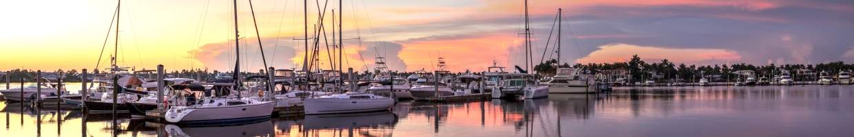 https://easyads.biz/wp-content/uploads/2022/02/Sunrise-over-a-quiet-harbor-in-old-Naples-Florida.jpg