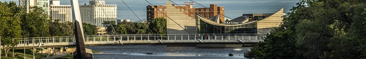 https://easyads.biz/wp-content/uploads/2022/03/Buildings-on-Arkansas-River-Wichita-Kansas.jpg