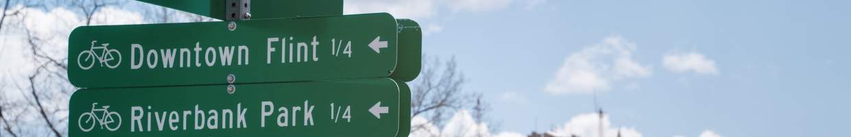 https://easyads.biz/wp-content/uploads/2022/03/Direction-signs-along-the-Flint-River-in-Flint-Michigan.jpg