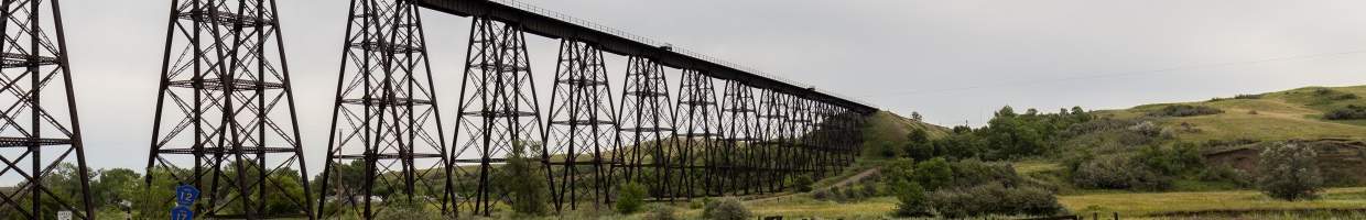 https://easyads.biz/wp-content/uploads/2022/03/Steel-truss-railroad-bridge-west-of-Minot-North-Dakota.jpg