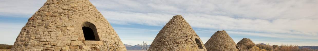 https://easyads.biz/wp-content/uploads/2022/03/charcoal-ovens-in-Ward-Mining-District-ghost-town-near-Ely-Nevada.jpg