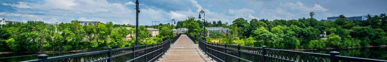 https://easyads.biz/wp-content/uploads/2022/06/Bridge-over-the-Merrimack-River-in-Manchester.jpg