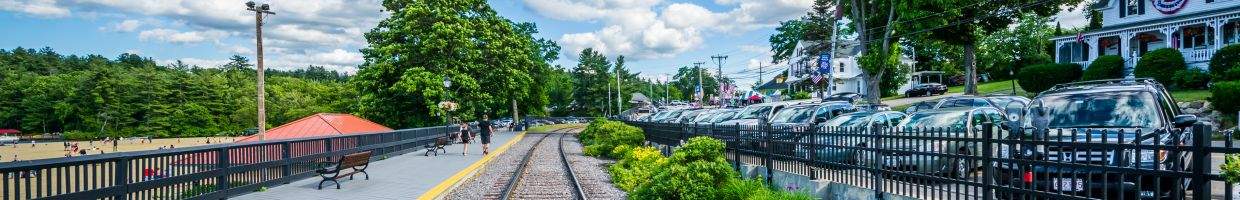 https://easyads.biz/wp-content/uploads/2022/06/Railroad-tracks-along-Weirs-Beach-in-Laconia-New-Hampshire.jpg